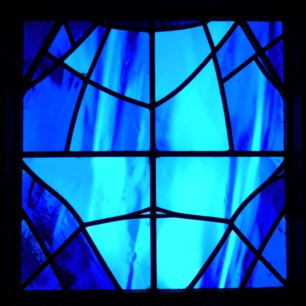 Icono circular azul con un número tres estilizado en blanco sobre fondo degradado